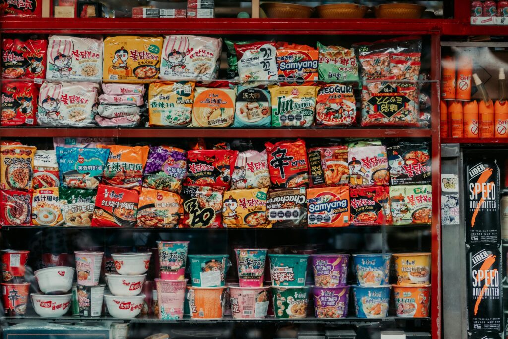 Display of assorted instant noodles and snacks at a market in Buenos Aires, Argentina.